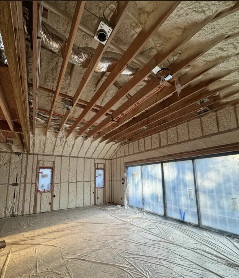 Interior walls and ceiling insulated with spray foam during new construction in Prairieville